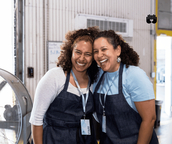 Two women smiling